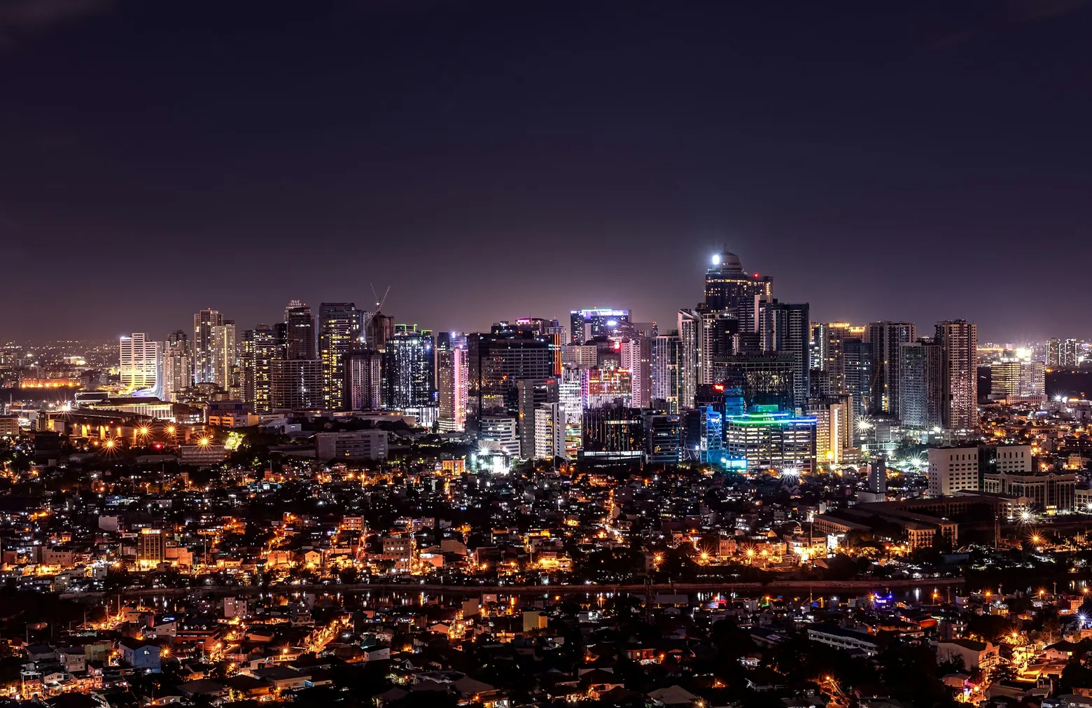 Makati city skyline lit up at night
